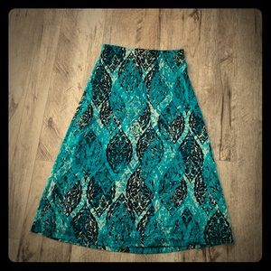 Green, black and white maxi skirt.